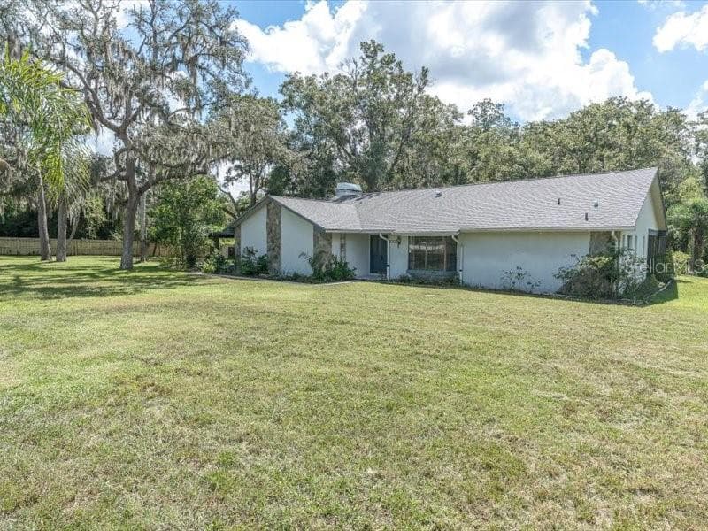 Single Family Residence at 11211 PINE FOREST DR, NEW PORT RICHEY, photo 4 of 47