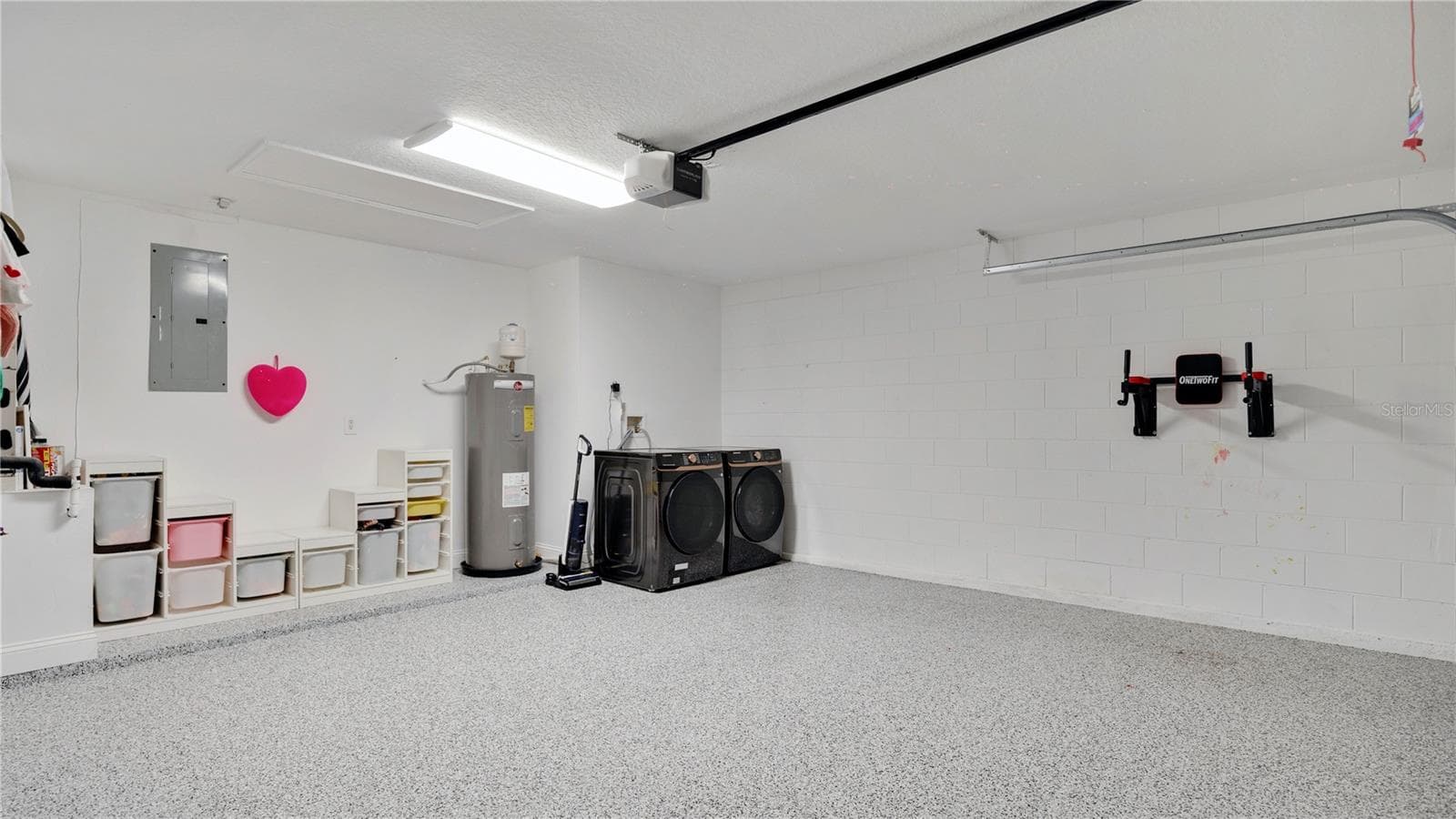 Two-car garage with laundry hookups - 2685 GROVELAND AVE, DELTONA