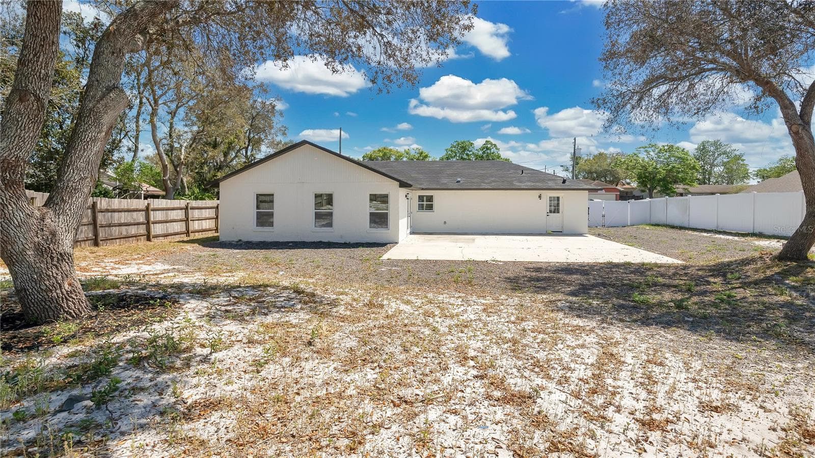 Rear exterior and yard - 2685 GROVELAND AVE, DELTONA