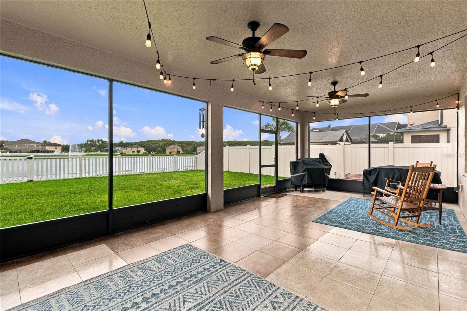 Florida Room with water view - 4909 STONE ACRES CIR, ST CLOUD