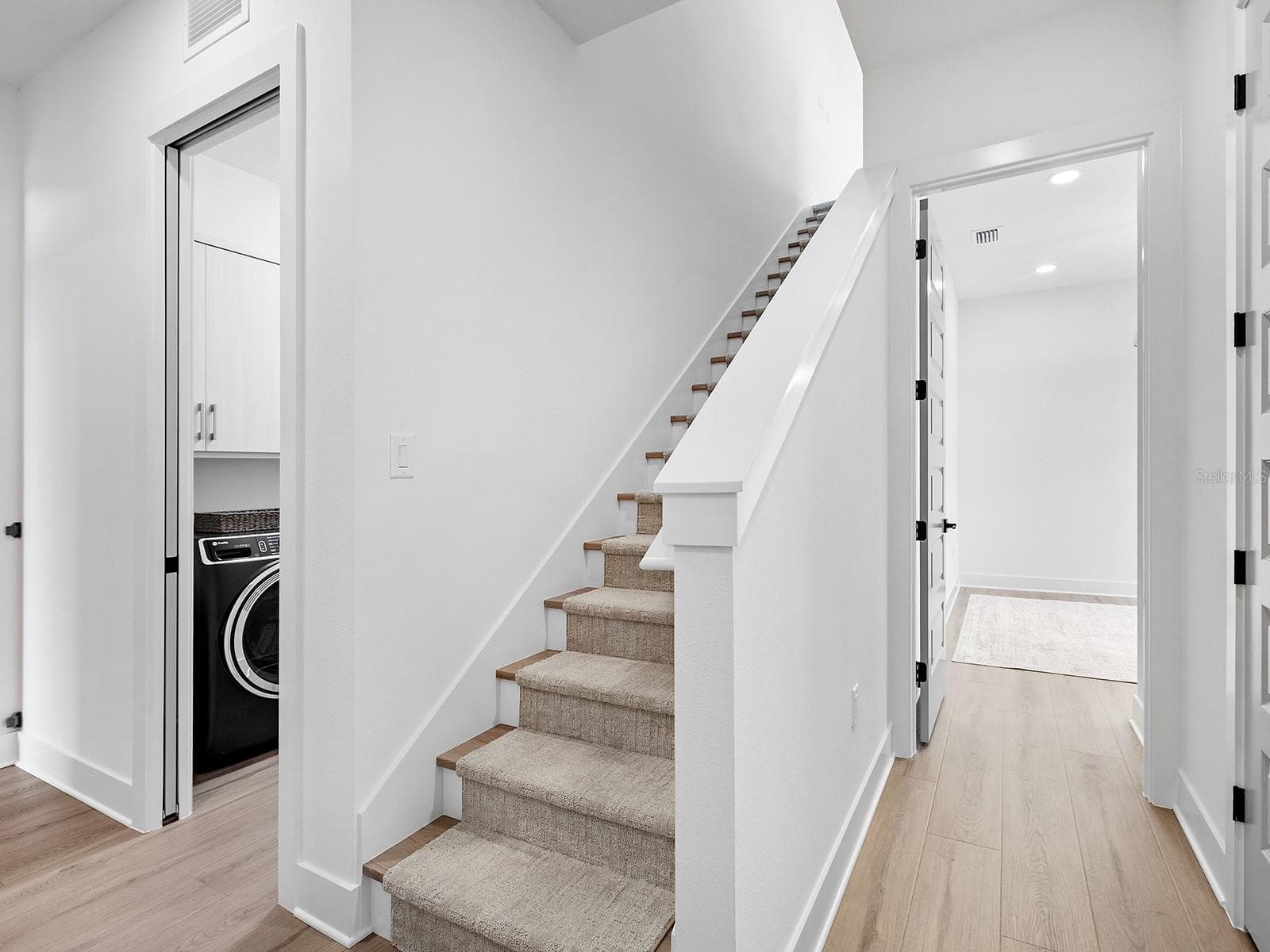 Stairs with 2026 carpet runner - 1320 IVORY TUSK CIR, SARASOTA