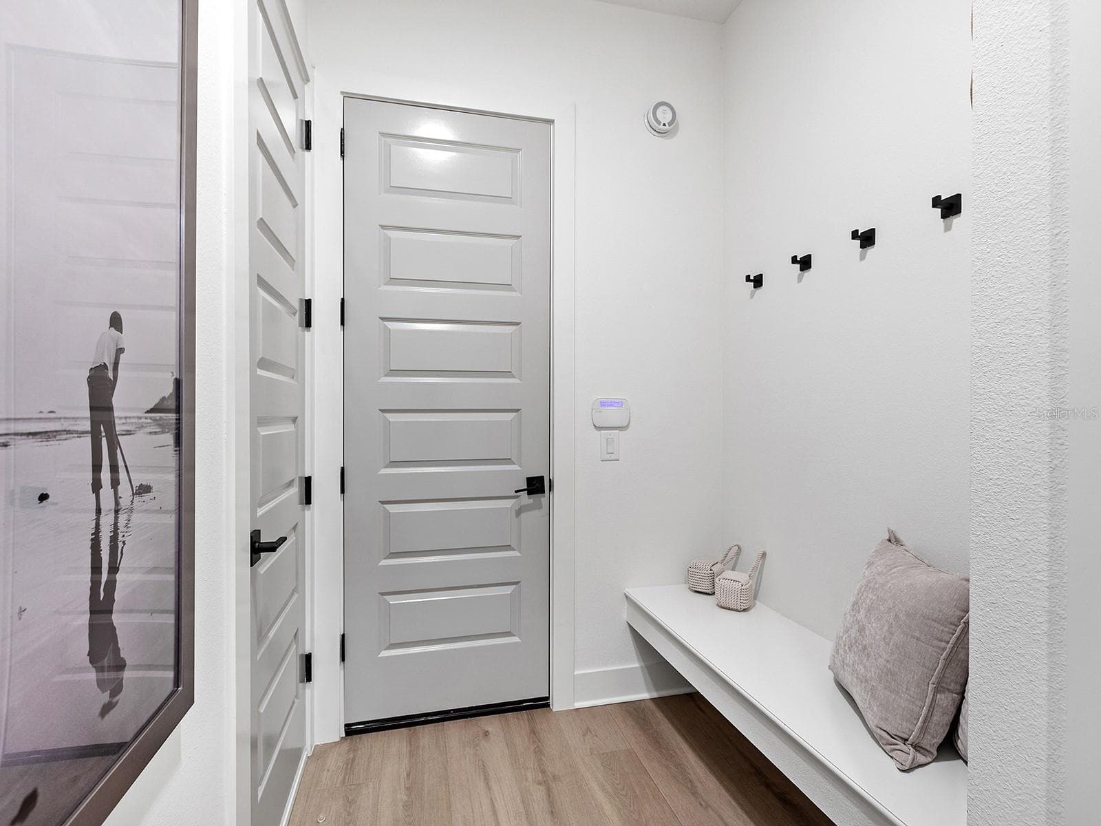 Mudroom entry with built-in bench - 1320 IVORY TUSK CIR, SARASOTA