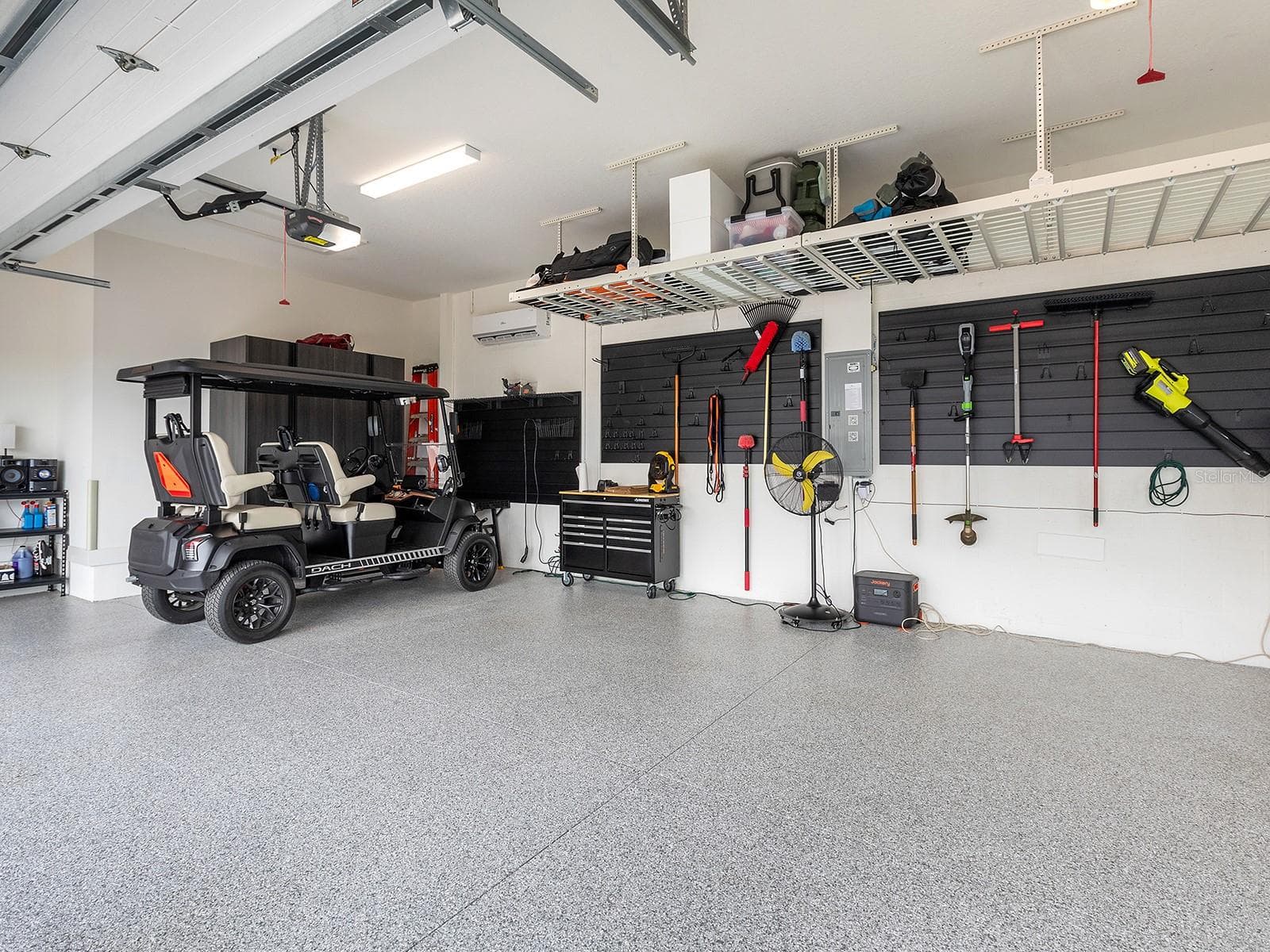 Garage with AC mini-split and storage - 1320 IVORY TUSK CIR, SARASOTA