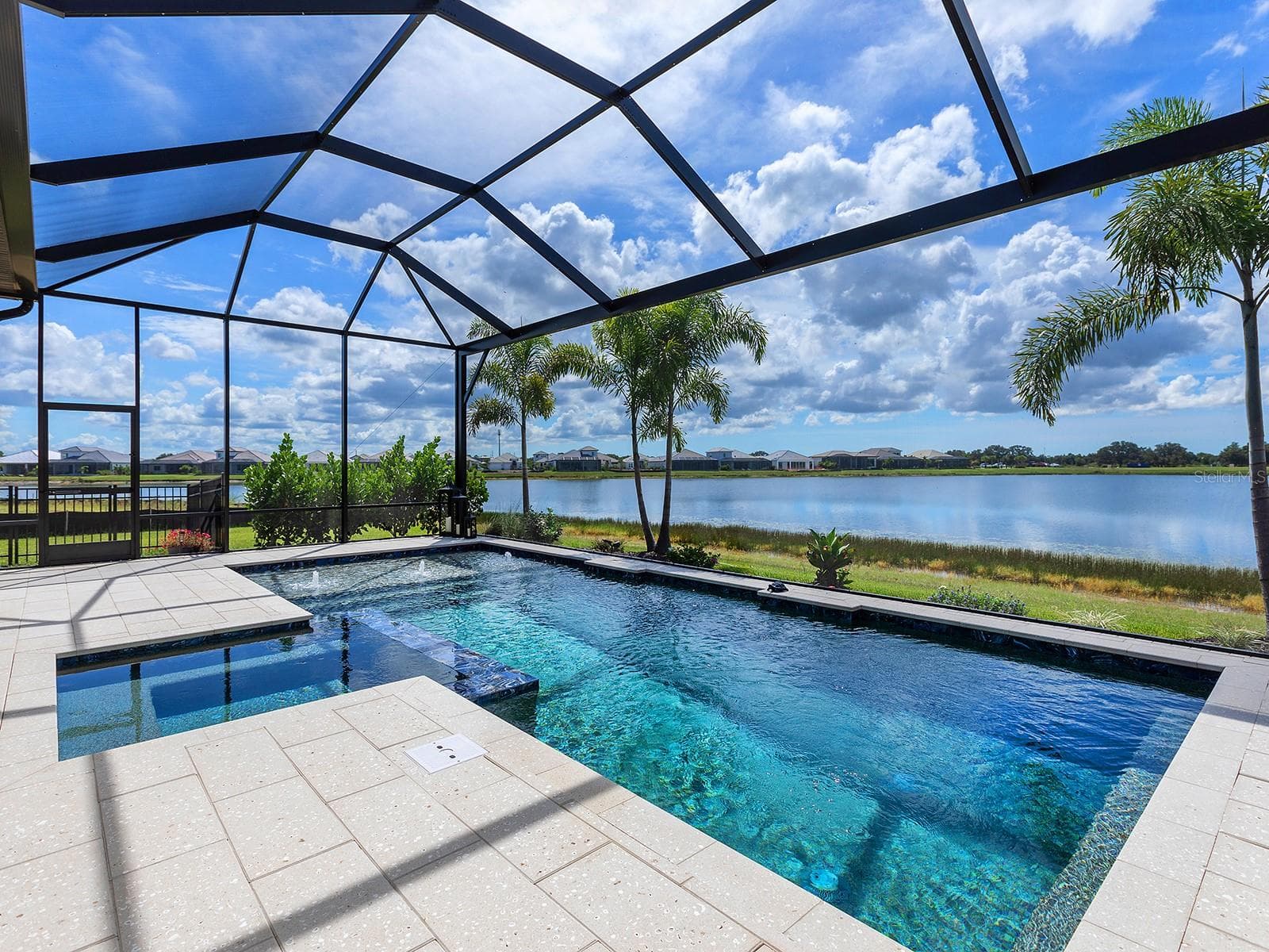 Fenced dog run in the side yard - 1320 IVORY TUSK CIR, SARASOTA