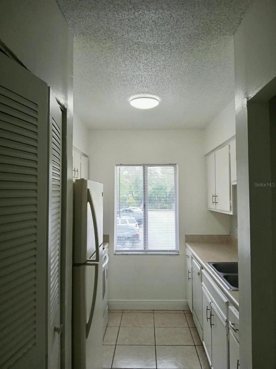 Condominium at 7511 PRESLEY PL #102, TAMPA, photo 5 of 13