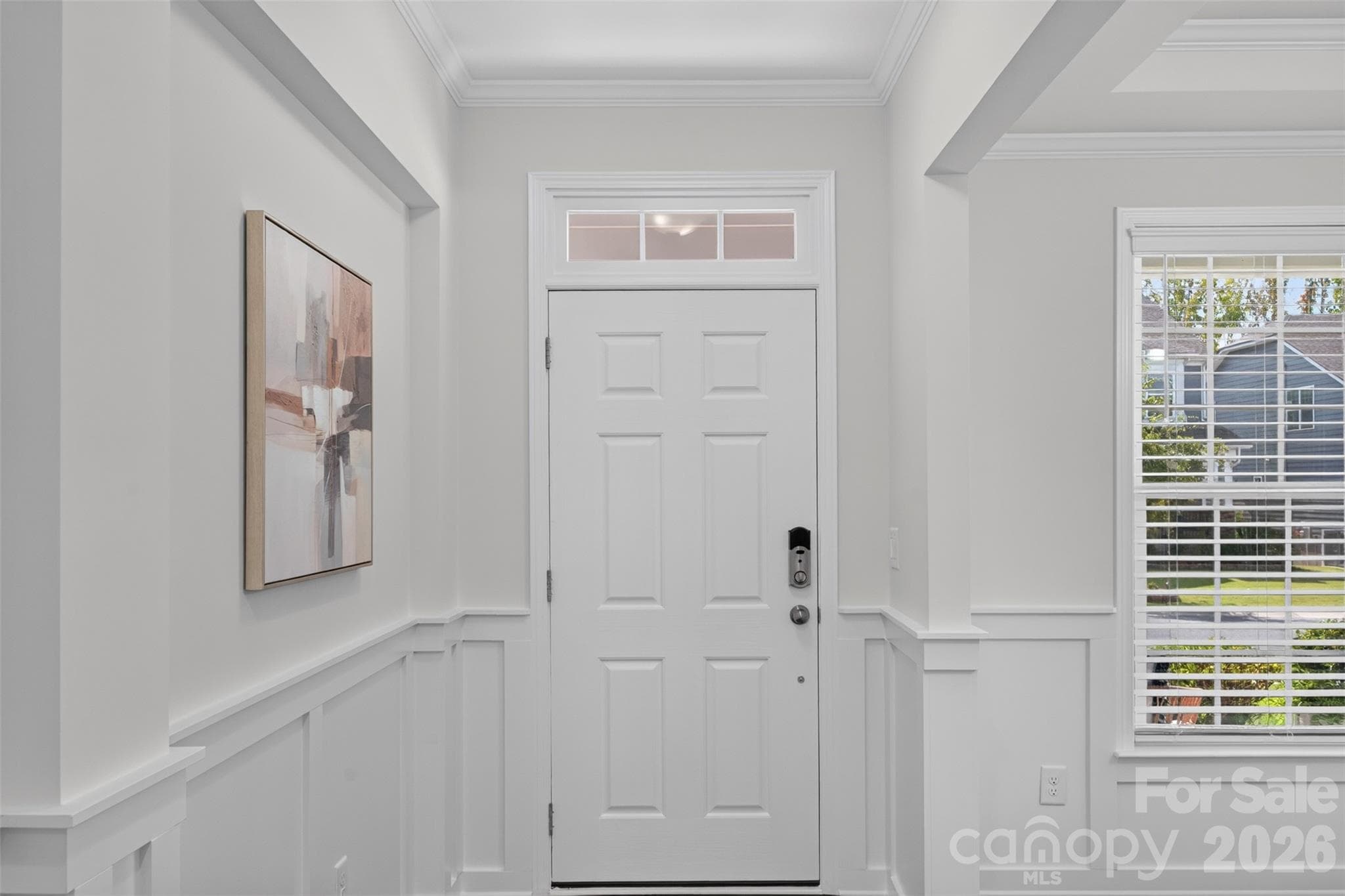 View of front door from entry hall. Dining room to the right. - 4638 Monument Valley Drive, Indian Land