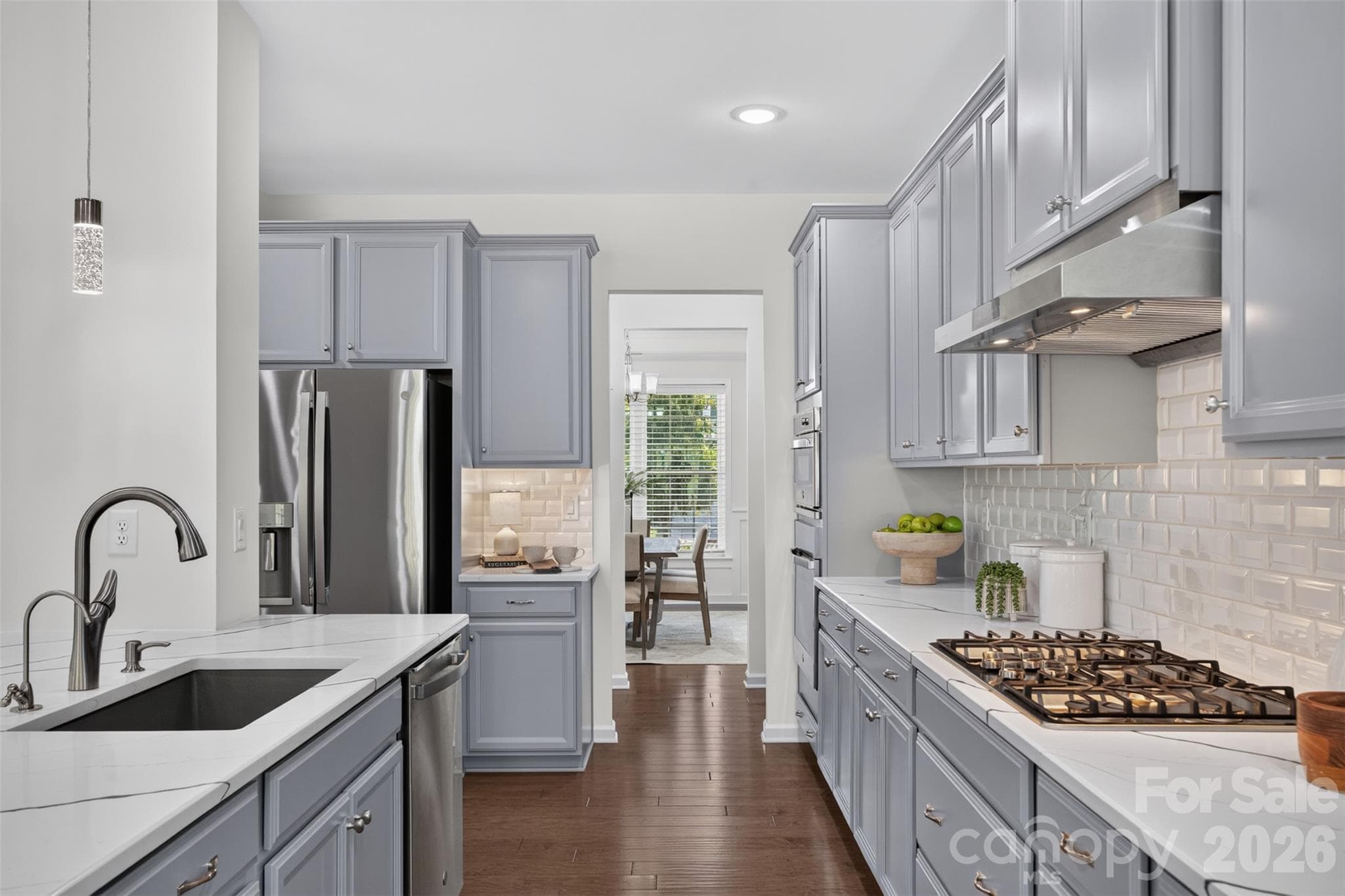 Chefs' kitchen with vented gas cooktop. - 4638 Monument Valley Drive, Indian Land