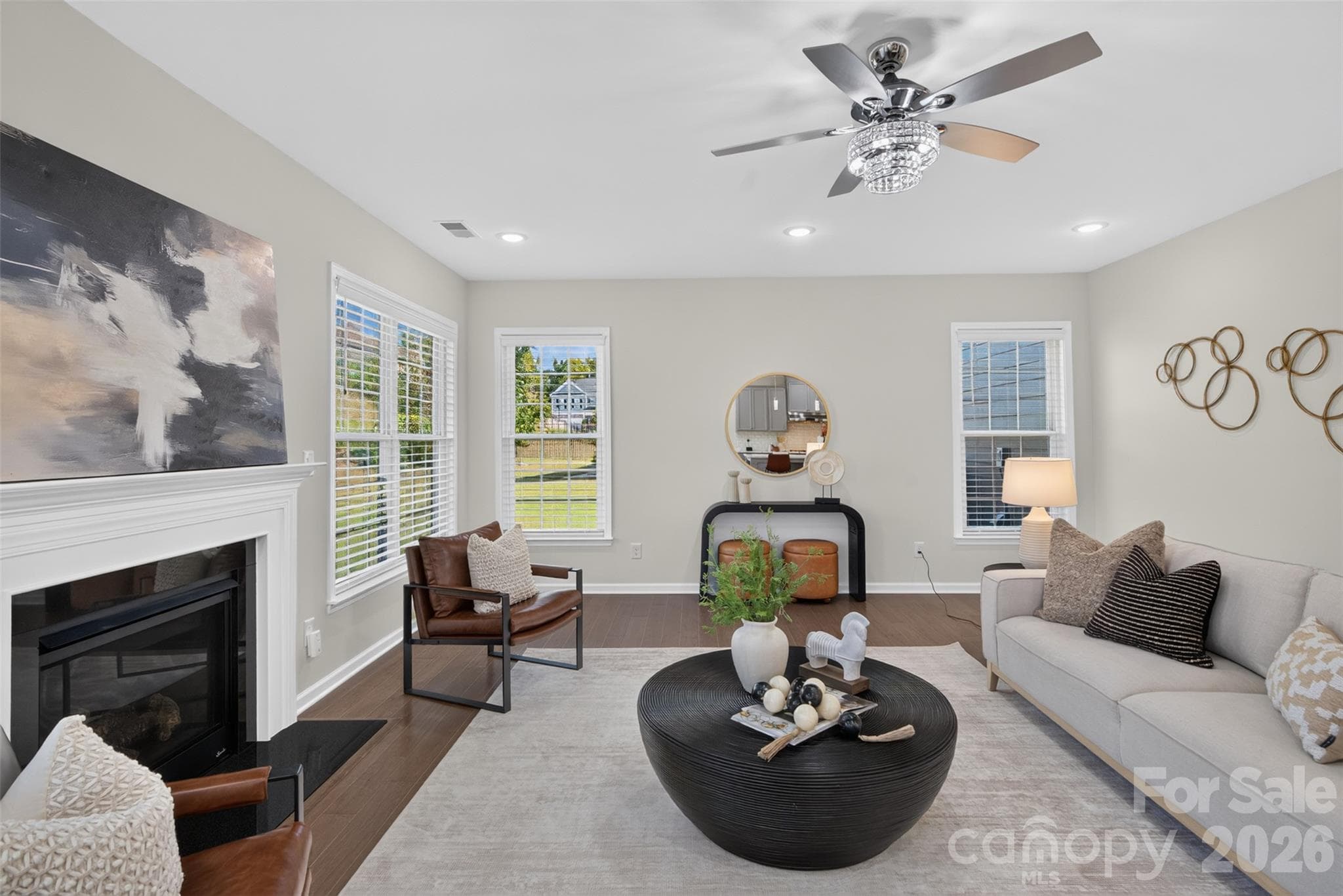 Large, light-filled family room with gas fireplace. - 4638 Monument Valley Drive, Indian Land