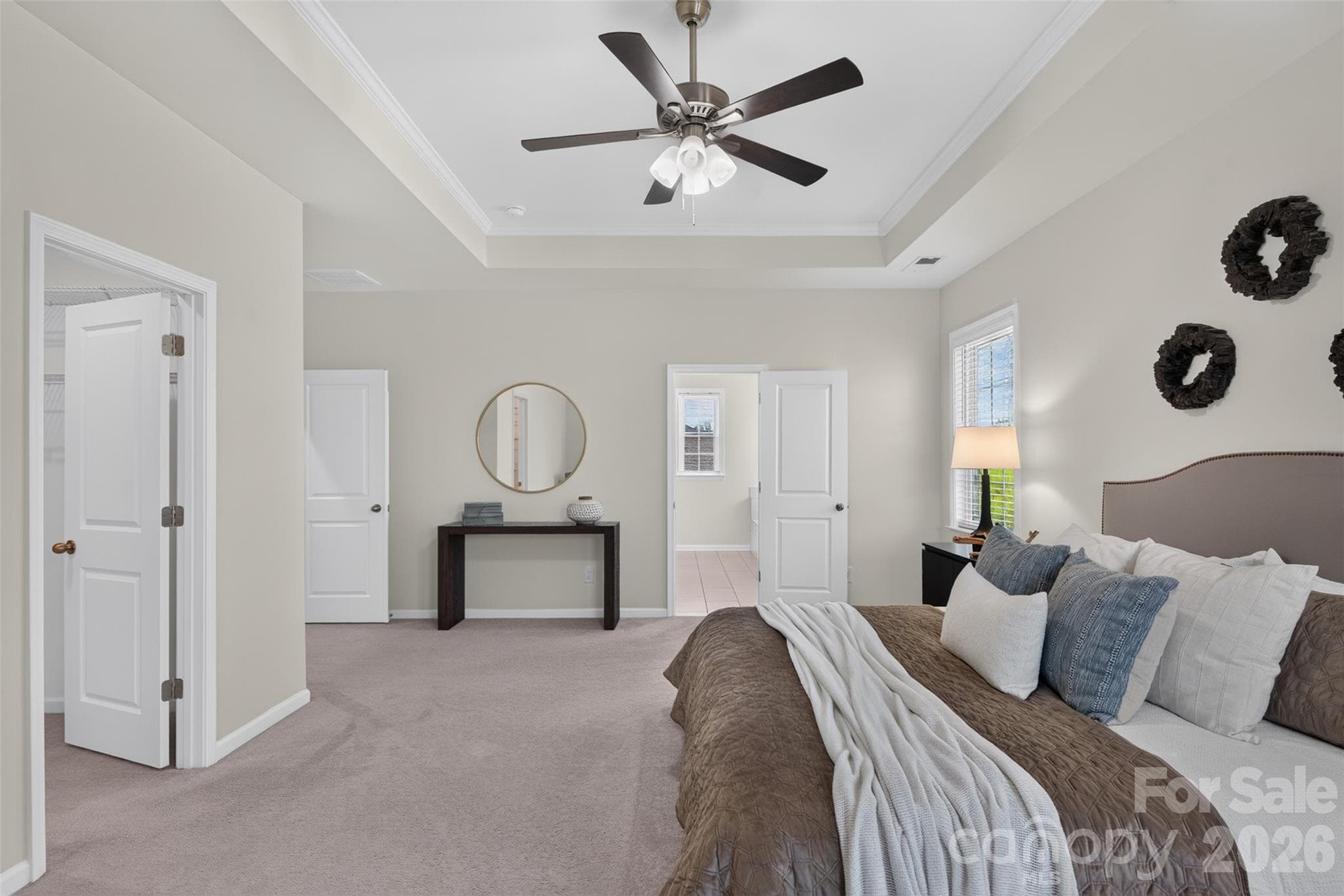Primary bedroom suite with large walk-in closet and luxurious bathroom. - 4638 Monument Valley Drive, Indian Land