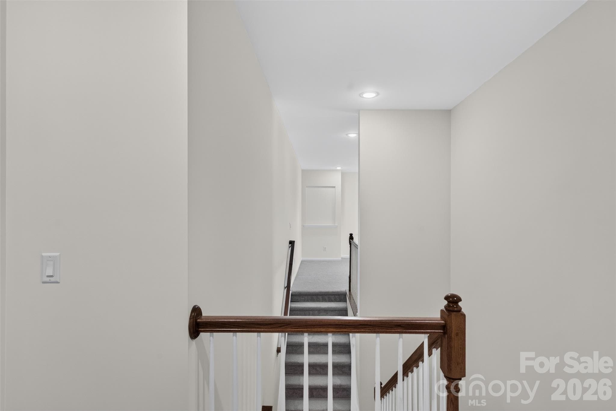 View from bedroom side of the second floor over to the bonus room stairs. - 4638 Monument Valley Drive, Indian Land