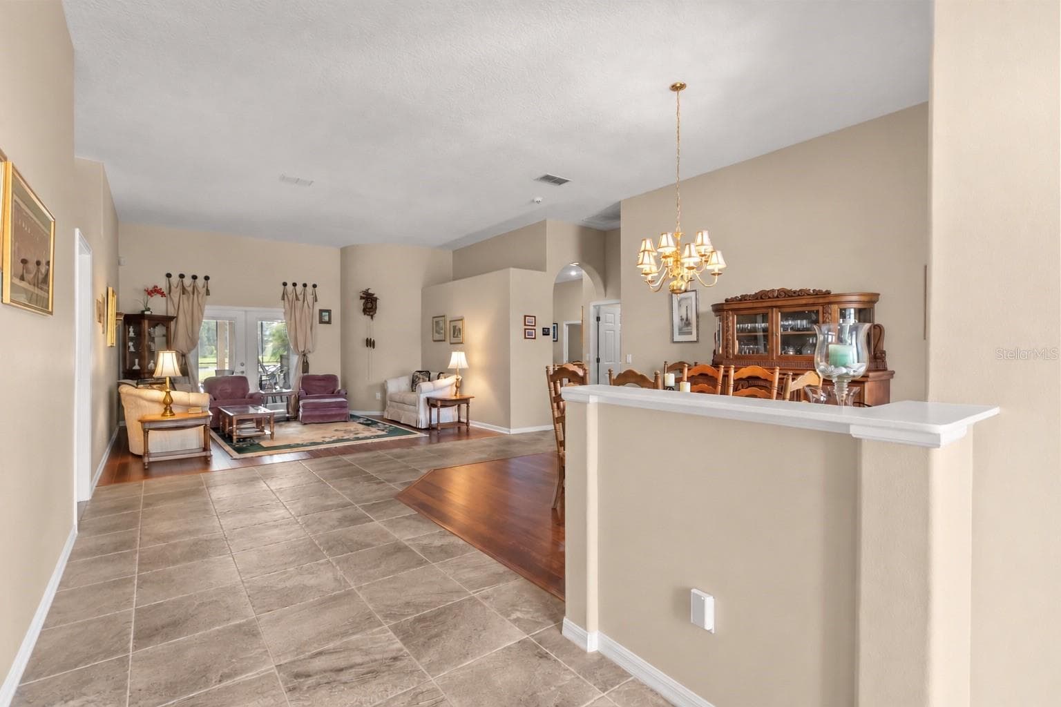 Pool view upon entry in the home with oversized foyer - 2735 TETON STONE RUN, ORLANDO