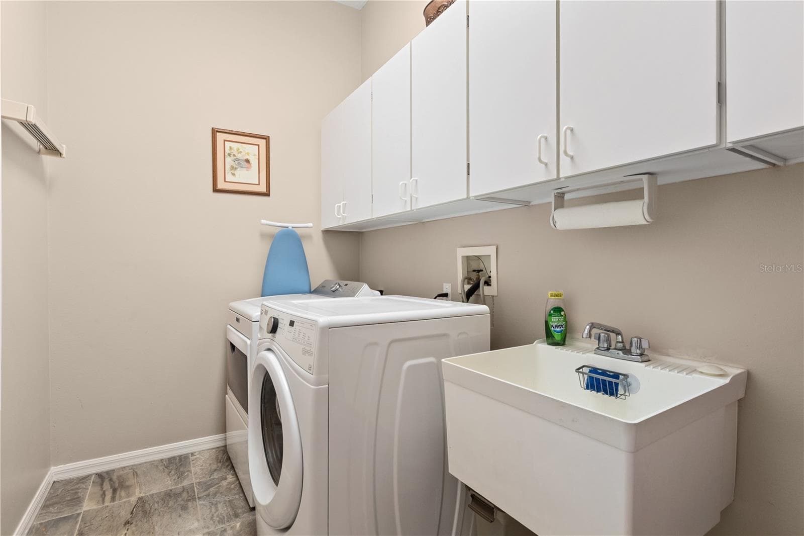 Spacious laundry room with plenty of room for storage and a sink - 2735 TETON STONE RUN, ORLANDO
