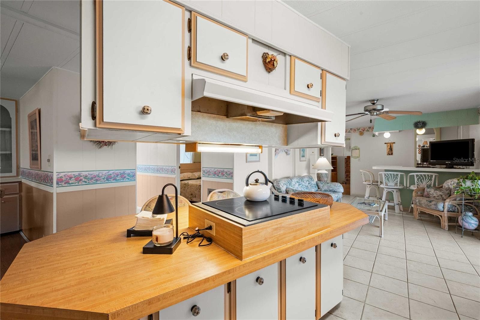 Center island with plenty of storage. - 5352 PLANT ST, ZEPHYRHILLS