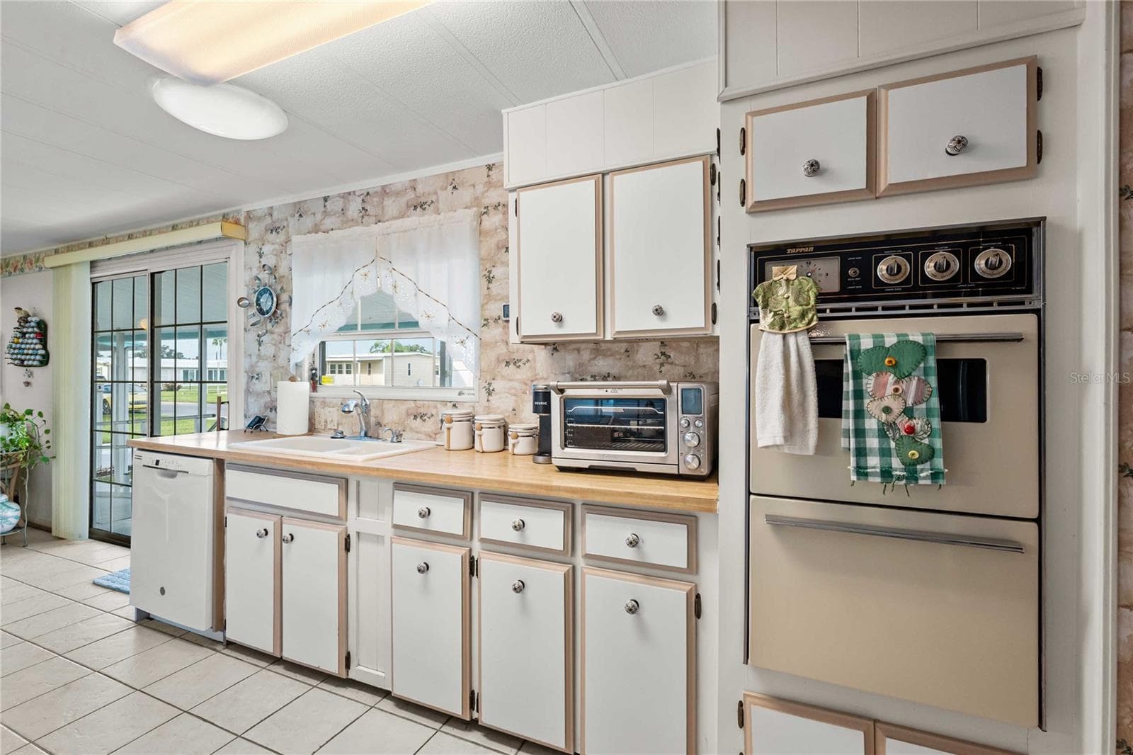 Double oven and plenty of countertop space. - 5352 PLANT ST, ZEPHYRHILLS