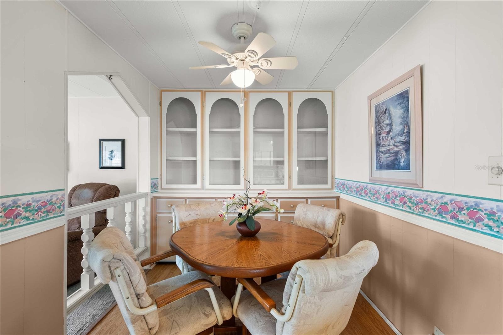 Dining room has built in storage. - 5352 PLANT ST, ZEPHYRHILLS