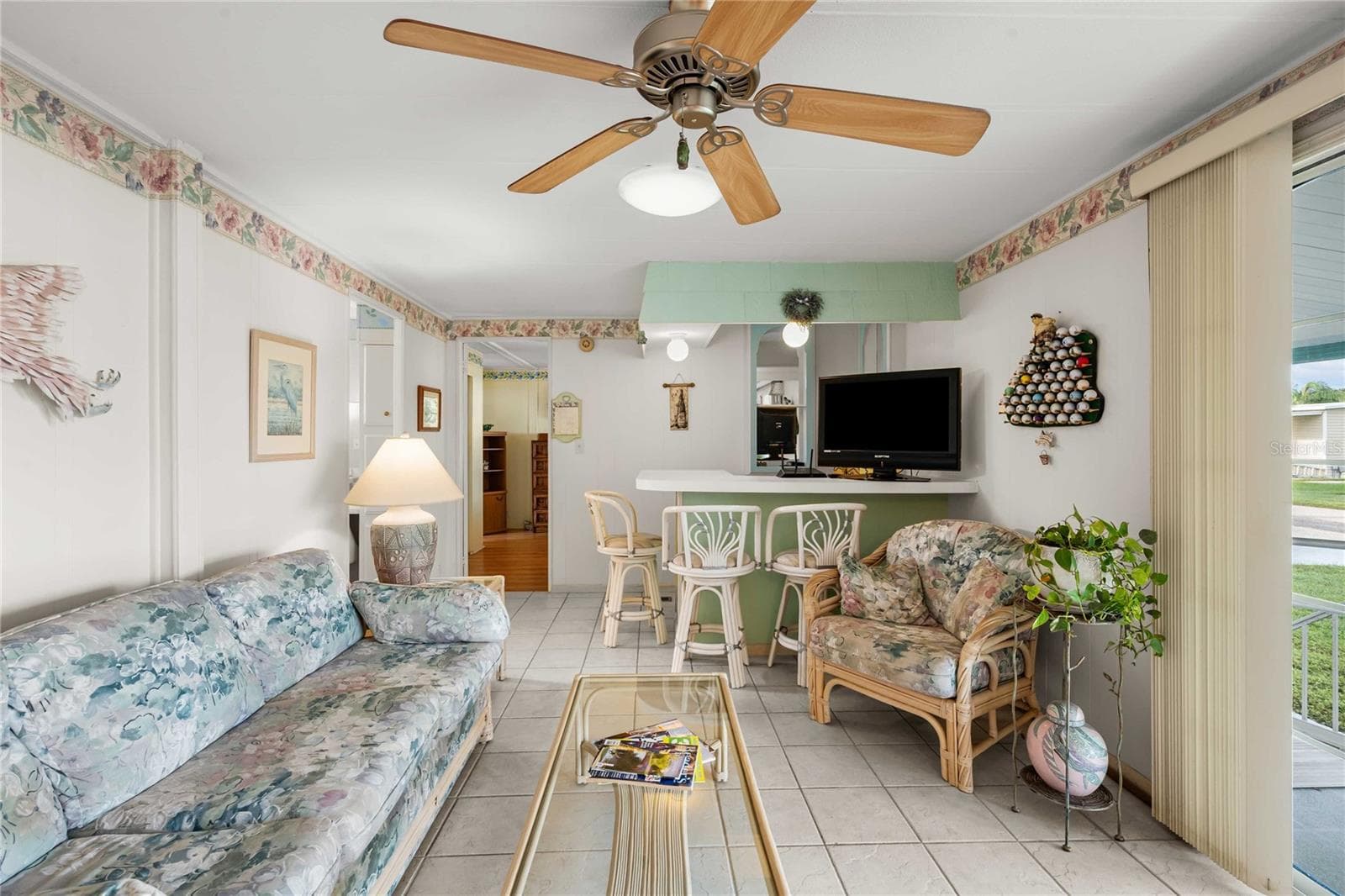 Family room is open with the kitchen. - 5352 PLANT ST, ZEPHYRHILLS