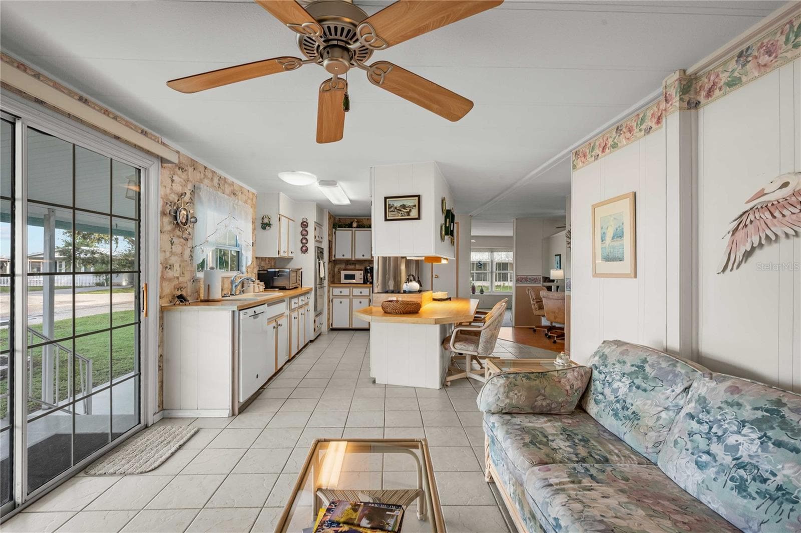 Tile flooring and ceiling fan! - 5352 PLANT ST, ZEPHYRHILLS