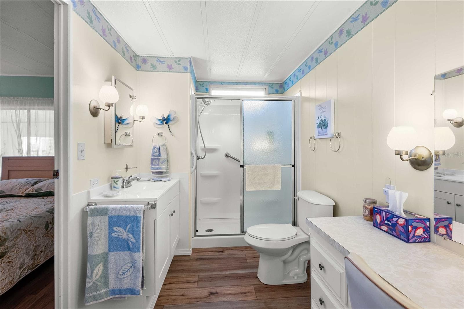 Guest bath has step-in shower. - 5352 PLANT ST, ZEPHYRHILLS