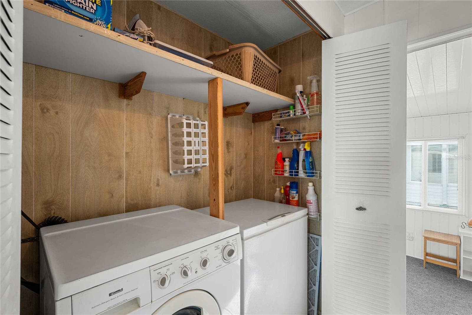 Inside laundry area. - 5352 PLANT ST, ZEPHYRHILLS