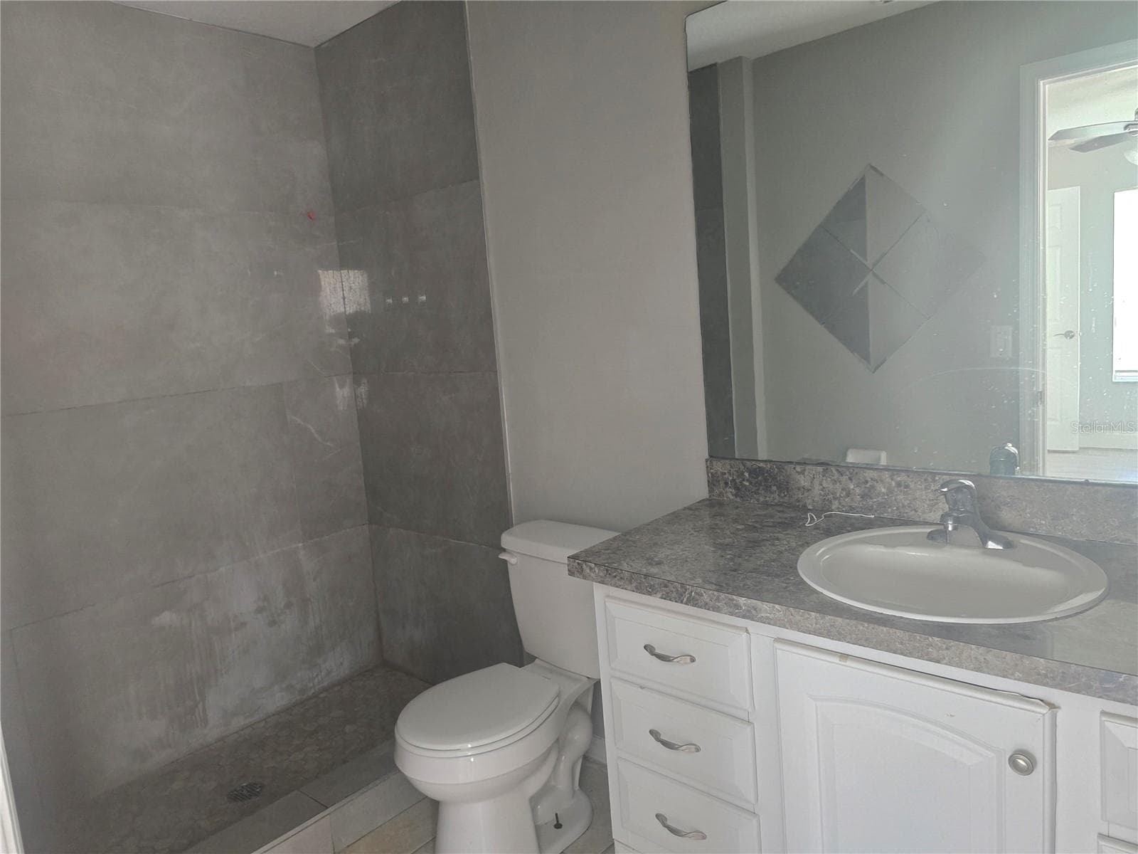 primary bath - 1704 SNOOK PL, POINCIANA