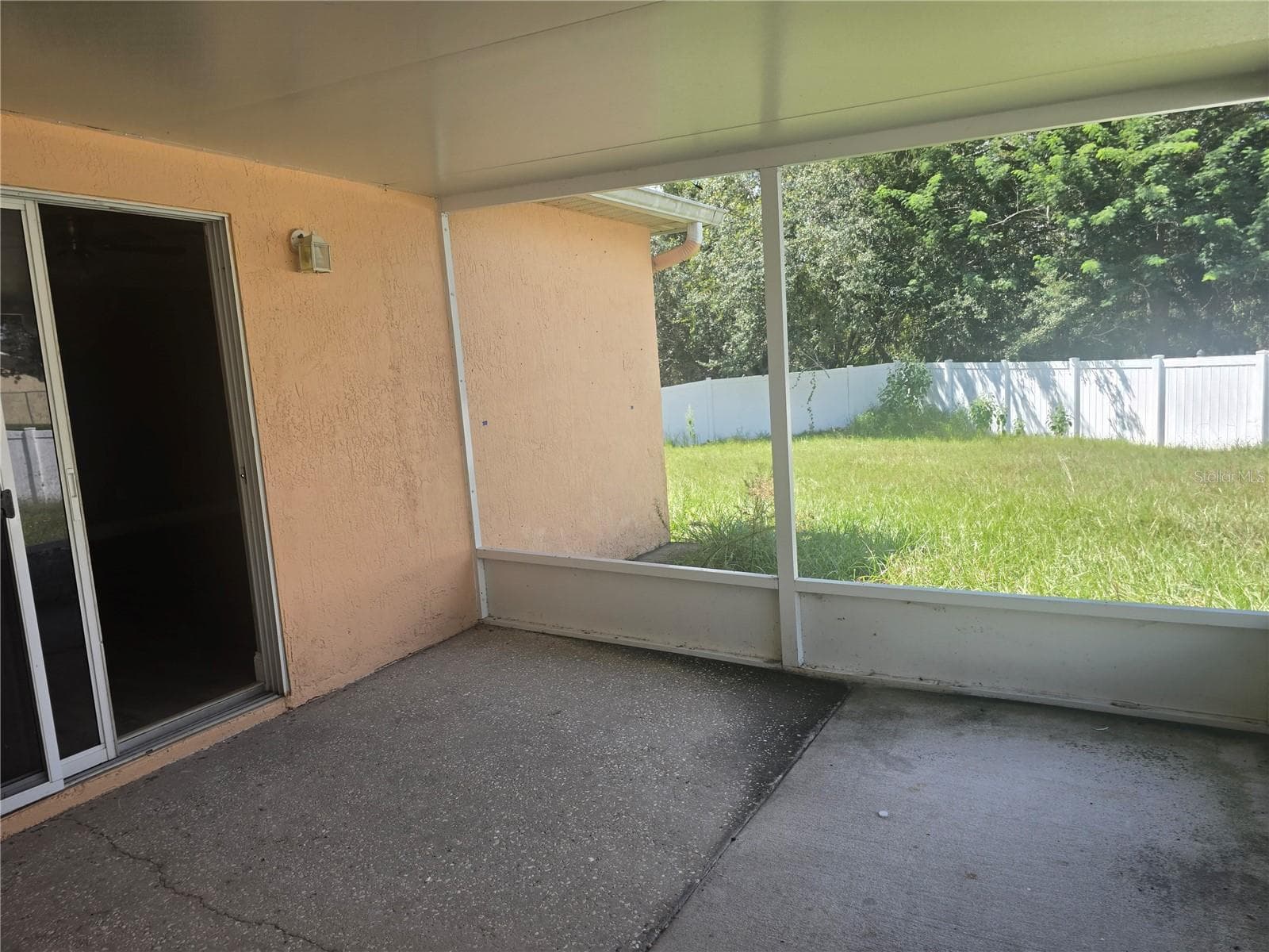 screened in back porch - 1704 SNOOK PL, POINCIANA