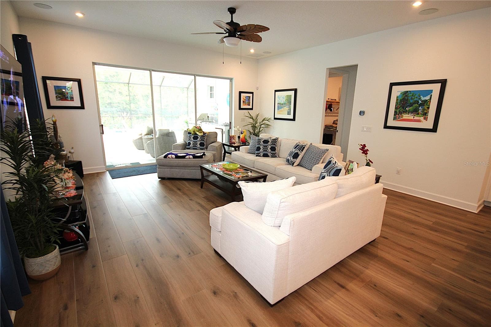 EXPANSIVE SLIDER TO OUTDOOR KITCHEN AND POOL DECK - 1859 BEACH RIDGE RD, CELEBRATION