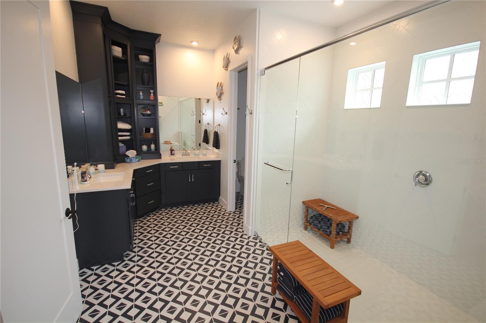 PRIMARY BATHROOM WITH UPGRADED CABINETRY - 1859 BEACH RIDGE RD, CELEBRATION