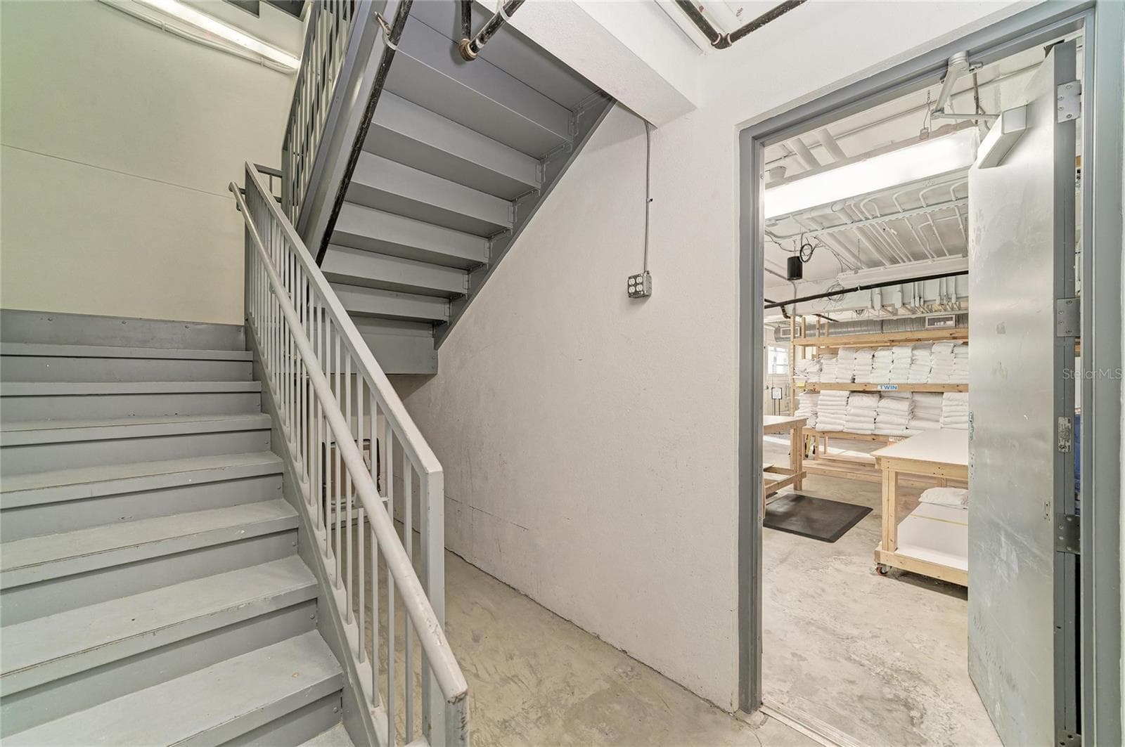 Interior egress stairs - 3004 AVENUE C, HOLMES BEACH