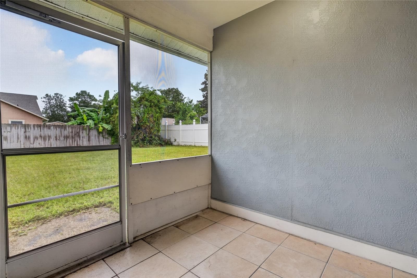 Screened and Covered Rear Porch - 39 FISCHER LN, PALM COAST