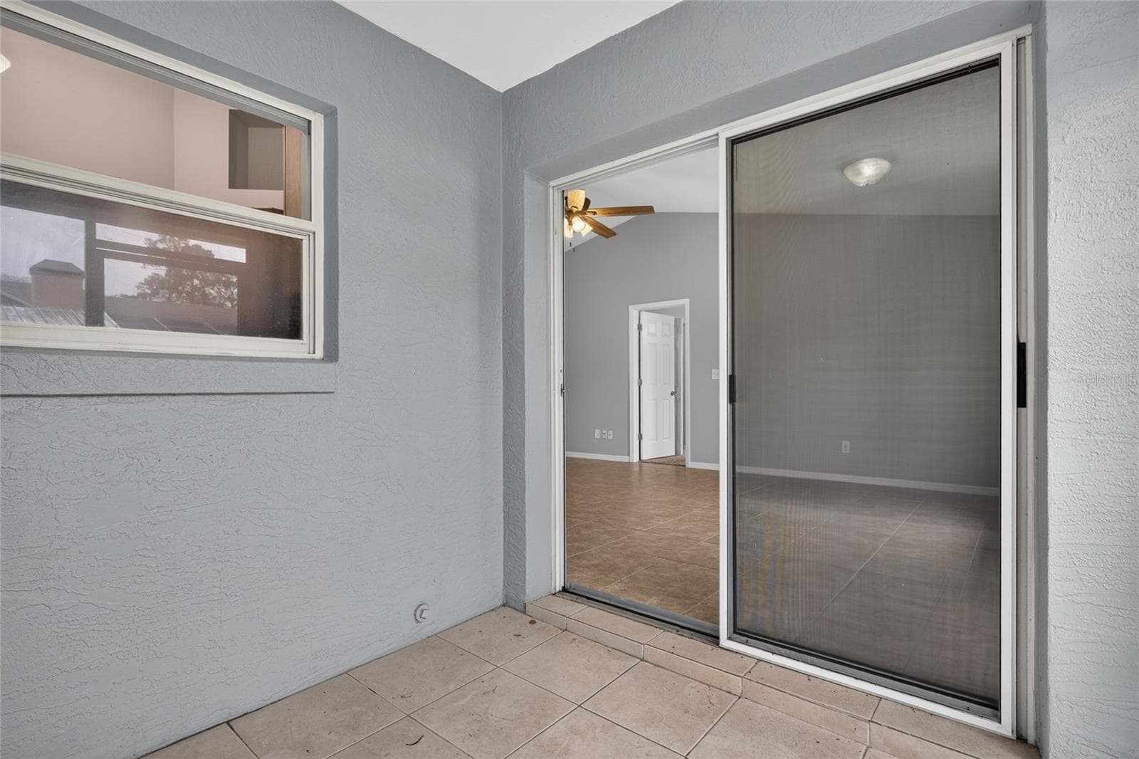 Screened and Covered Rear Porch - 39 FISCHER LN, PALM COAST