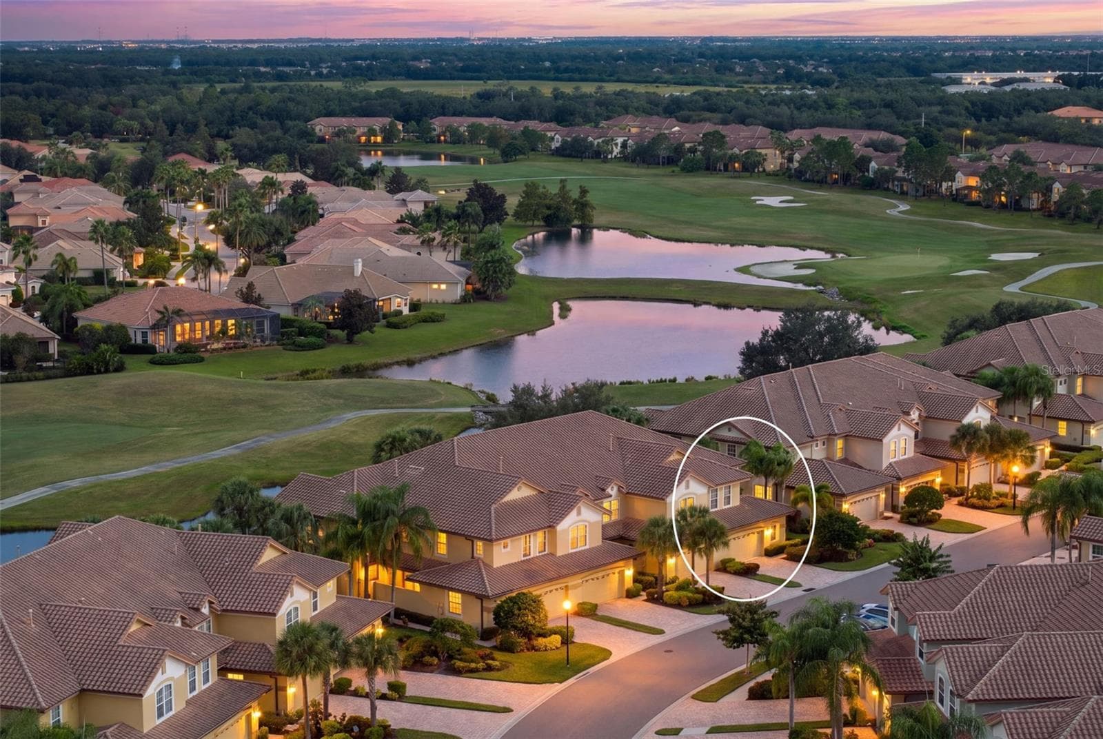 Beautiful lake and golf course surroundings set the scene for relaxed Lakewood Ranch living. - 8432 MIRAMAR WAY, LAKEWOOD RANCH