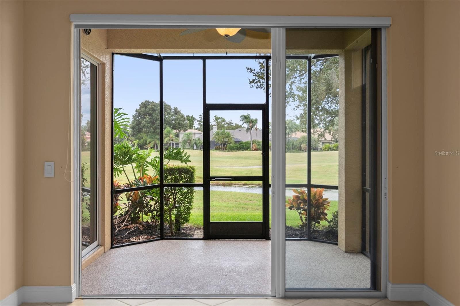 Your spot for morning coffee, fresh air, and peaceful views across the golf course. - 8432 MIRAMAR WAY, LAKEWOOD RANCH