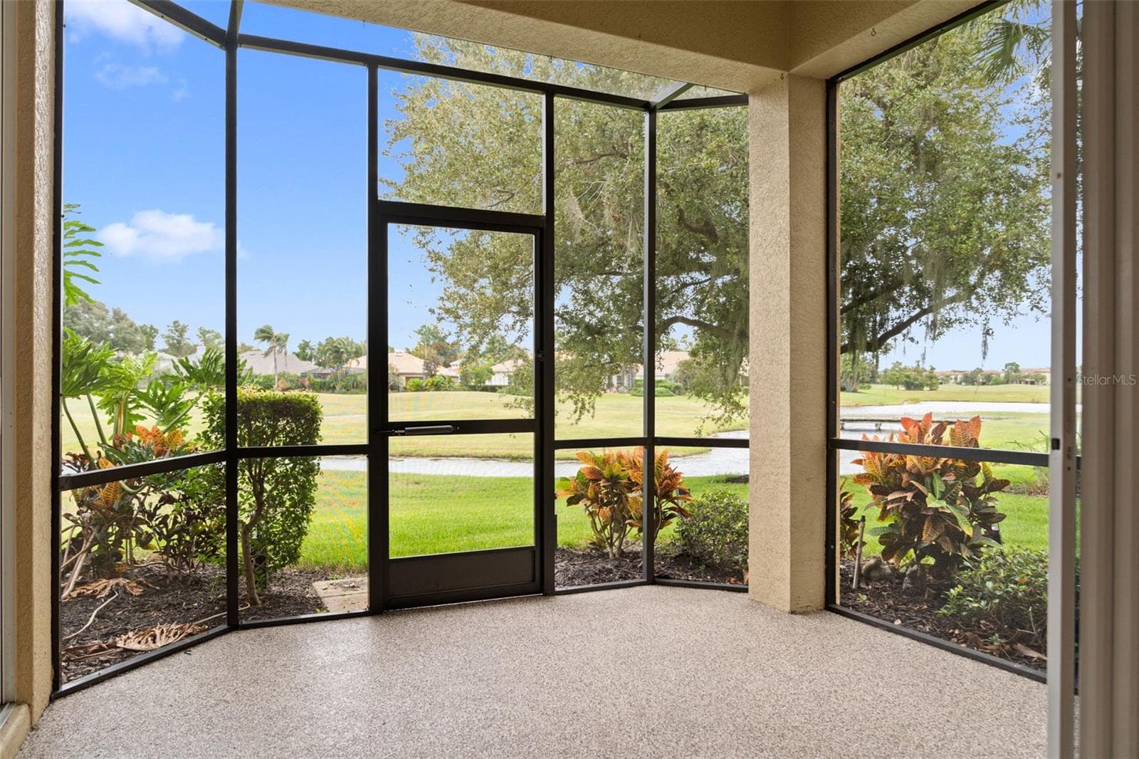 Your spot for morning coffee, fresh air, and peaceful views across the golf course. - 8432 MIRAMAR WAY, LAKEWOOD RANCH