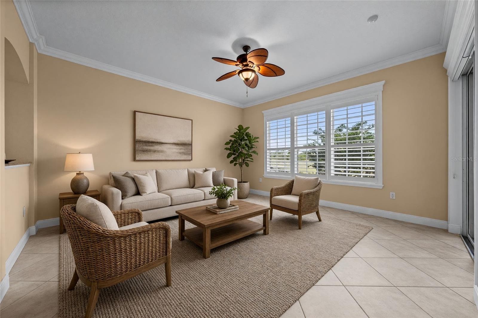 Just off the kitchen, this comfortable gathering space opens directly to the screened lanai. - 8432 MIRAMAR WAY, LAKEWOOD RANCH
