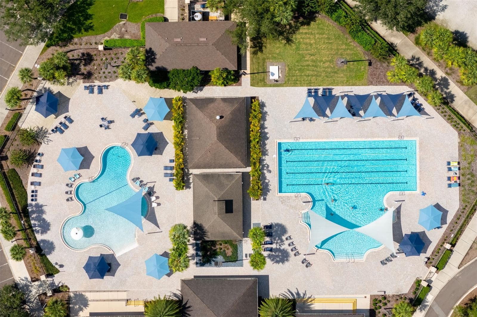 Lap lanes and resort-style pools offer another way to enjoy the Florida lifestyle with a separate club membership. - 8432 MIRAMAR WAY, LAKEWOOD RANCH