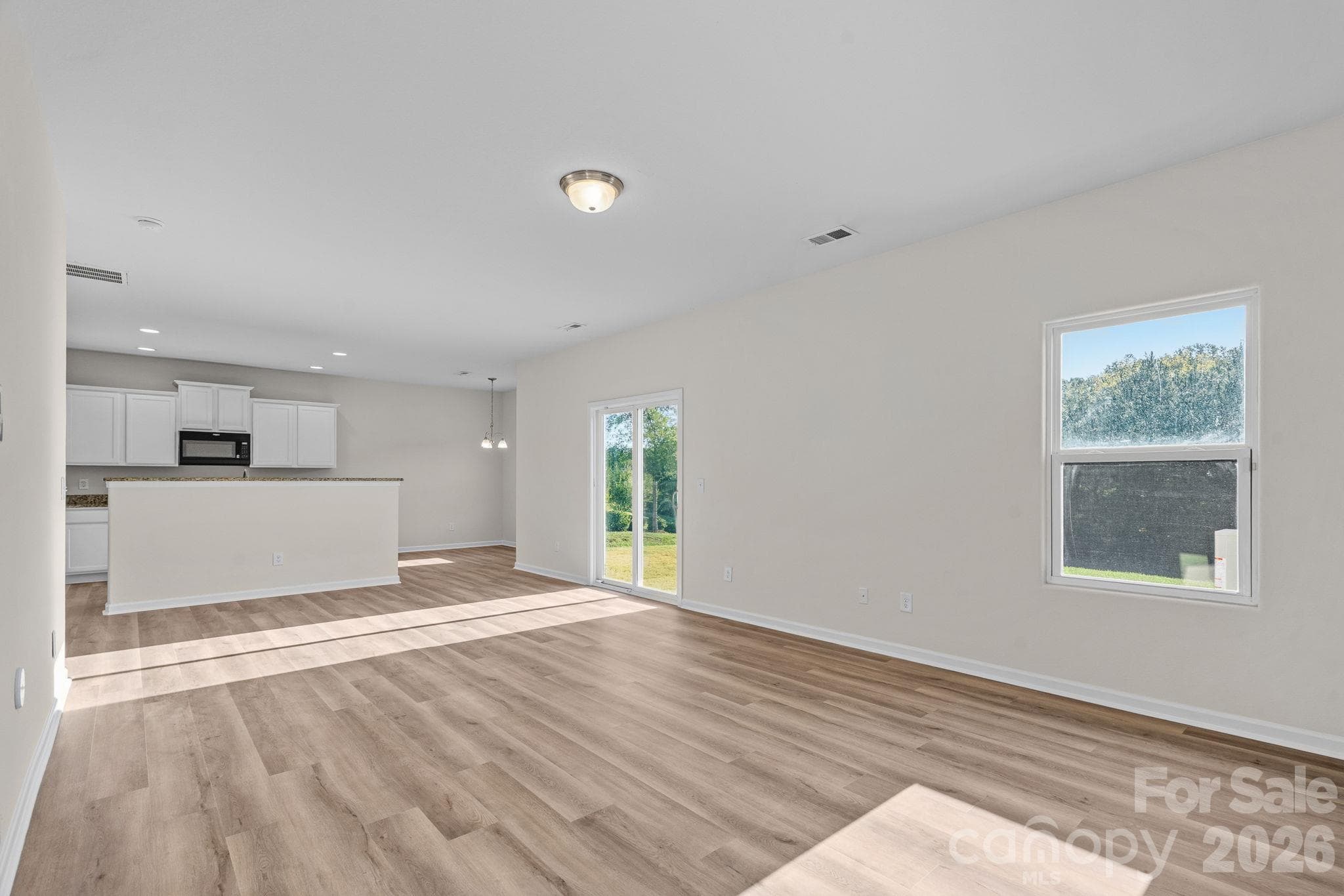 Open living / kitchen / dining - 6215 Paw Village Road, Charlotte