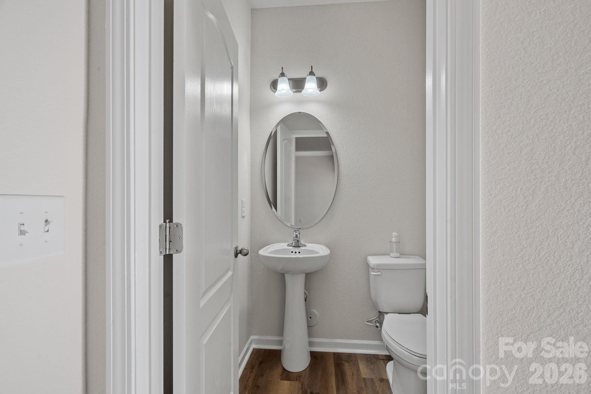 Downstairs powder room - 6215 Paw Village Road, Charlotte