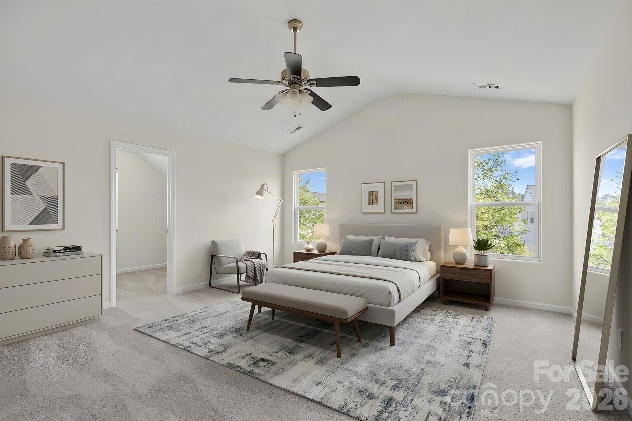 Virtually staged - Primary bedroom with vaulted ceiling - 6215 Paw Village Road, Charlotte