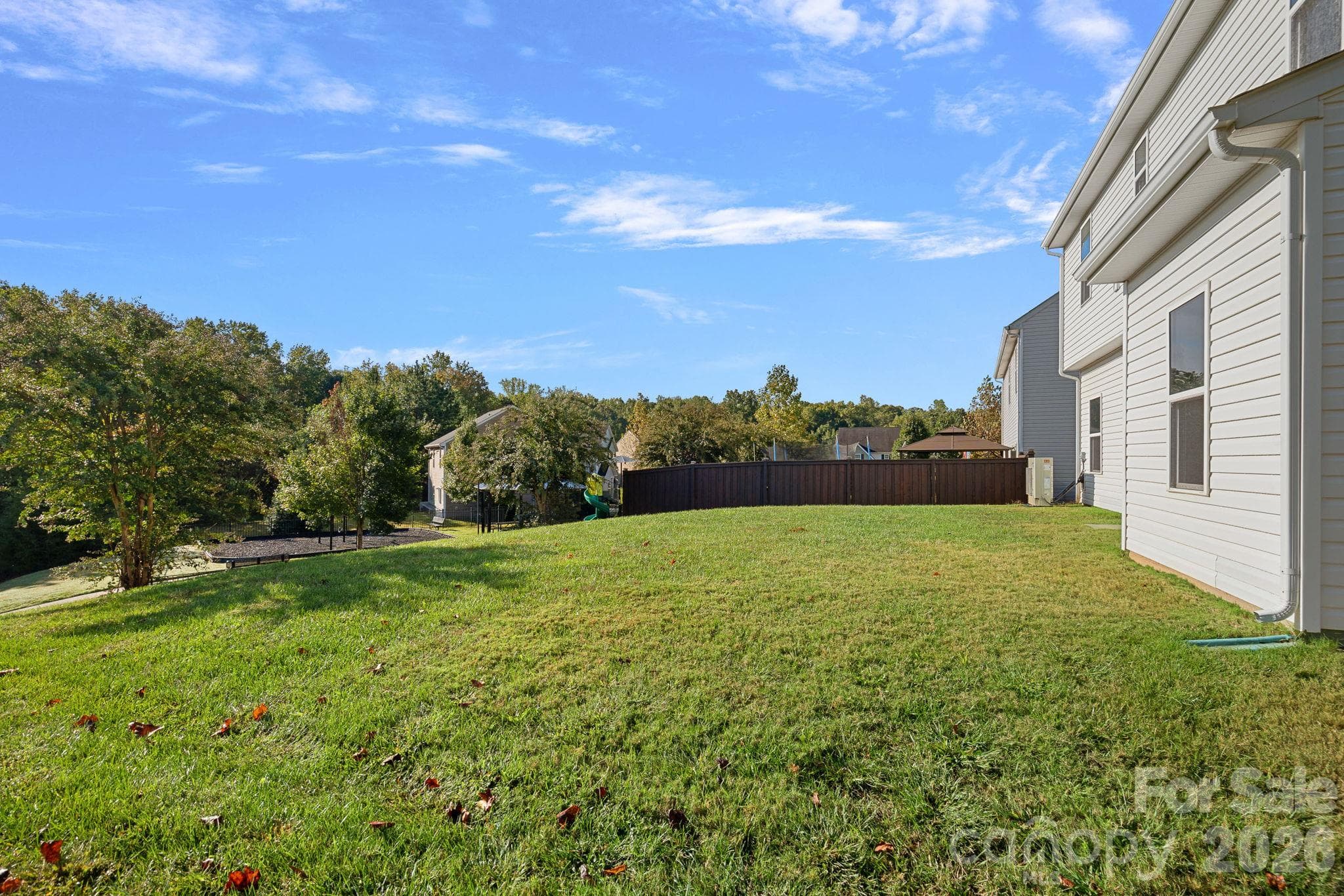 Back yard... steps from the community playground! - 6215 Paw Village Road, Charlotte