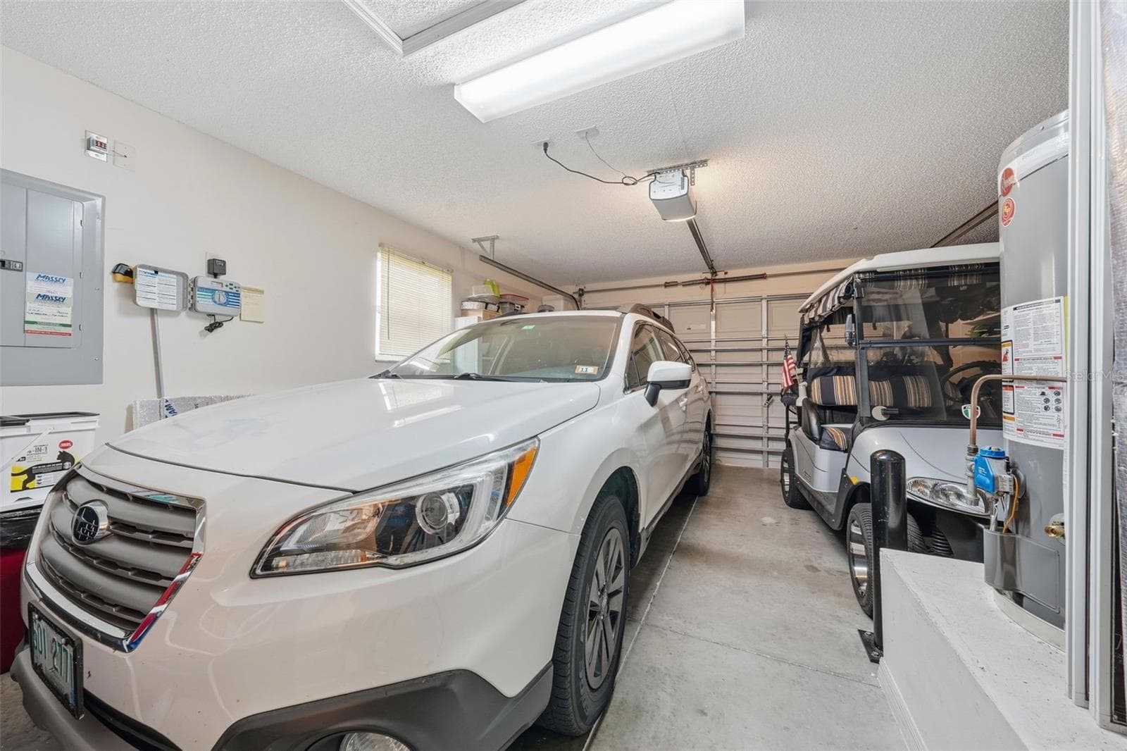 25'x18' Garage w/Golf Cart - 2800 PLAINRIDGE LOOP, THE VILLAGES
