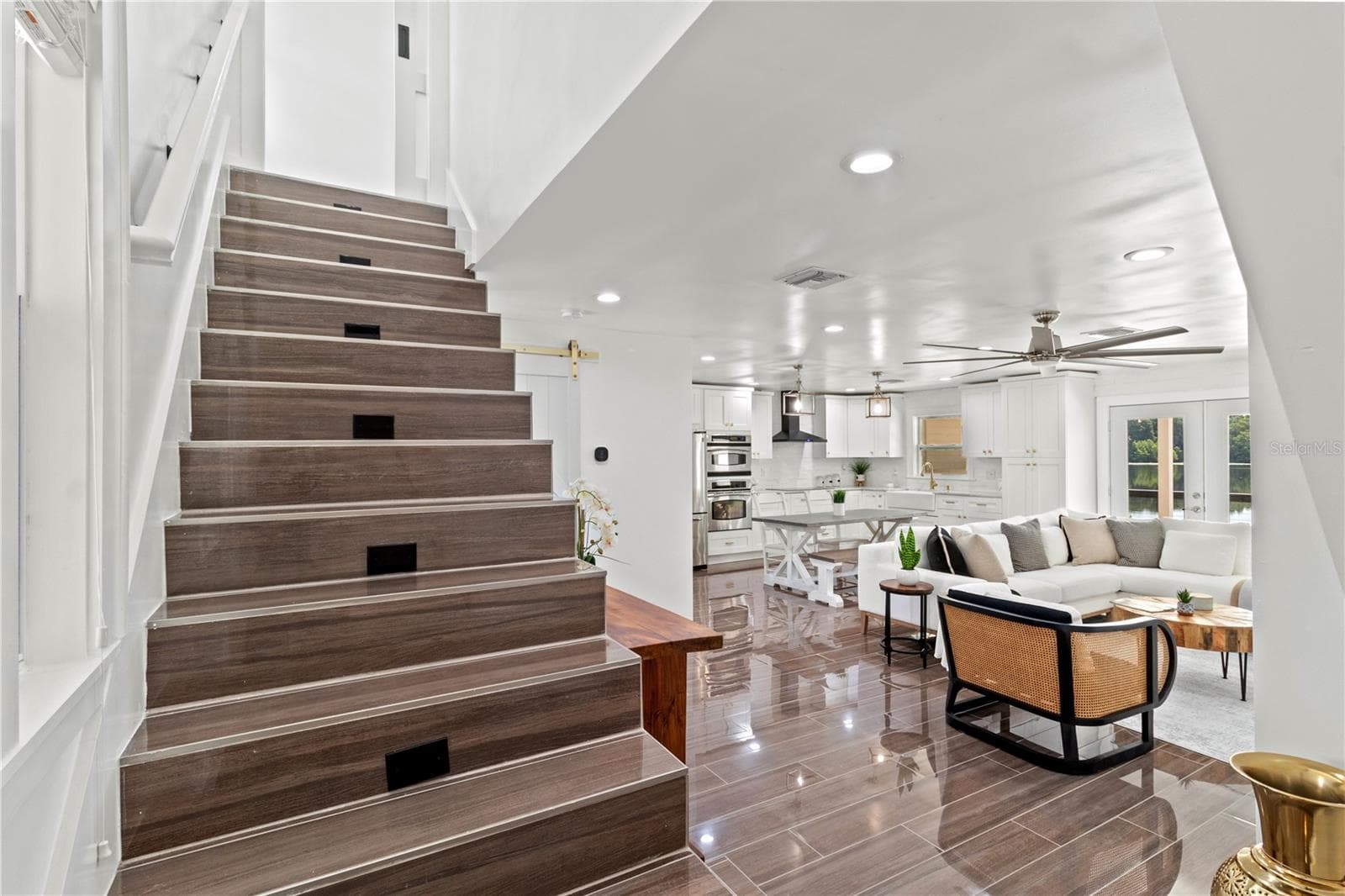 Stairs to third level - 10908 LAND O LAKES BLVD, LAND O LAKES