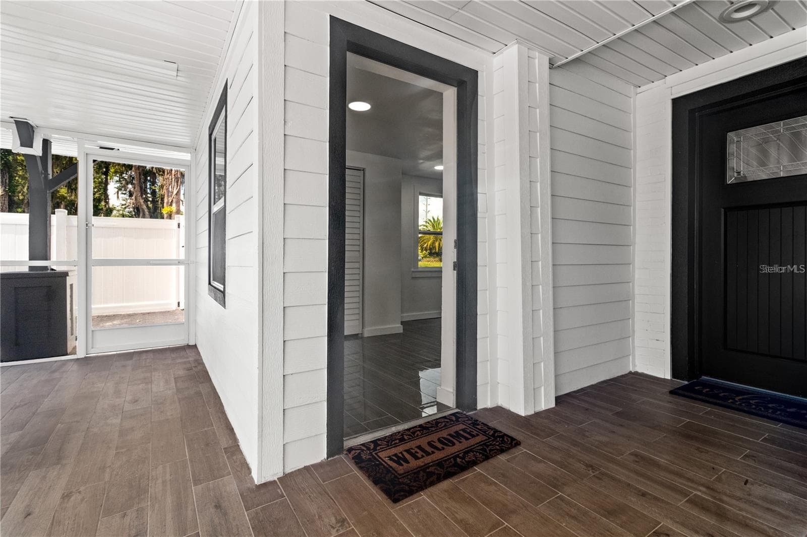 Private entrances to second primary bedroom and studio apartment - 10908 LAND O LAKES BLVD, LAND O LAKES