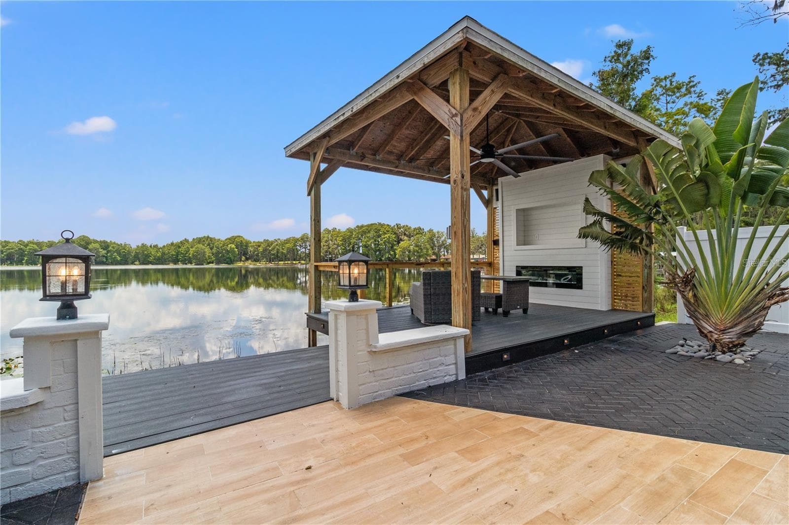 Custom Covered Deck overlooking Green Lake. (Ski and Boating allowed) - 10908 LAND O LAKES BLVD, LAND O LAKES