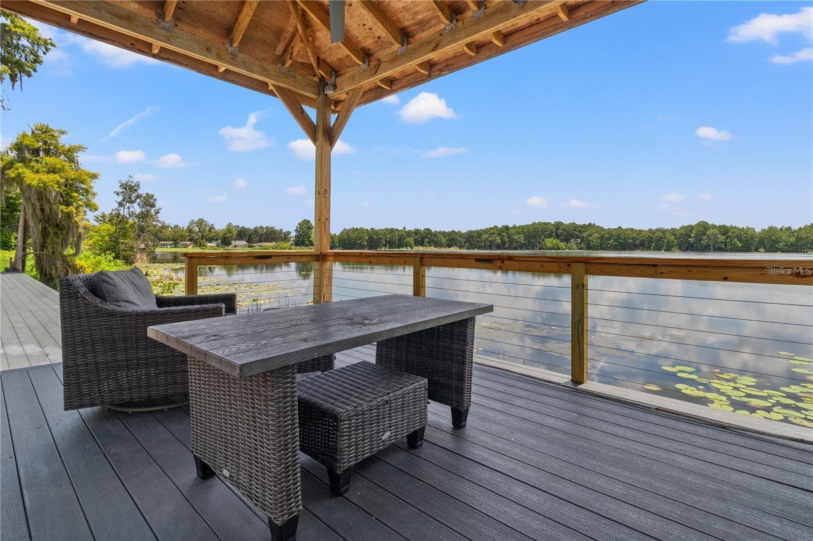Custom Covered Deck overlooking Green Lake. (Ski and Boating allowed) - 10908 LAND O LAKES BLVD, LAND O LAKES