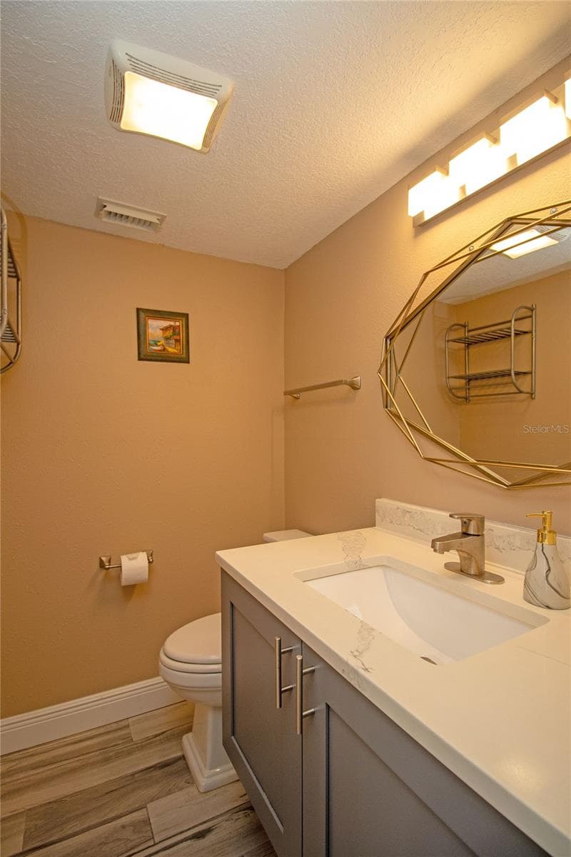 Powder room downstairs - 1640 CAPE HOPE AVE NE #2, ST PETERSBURG