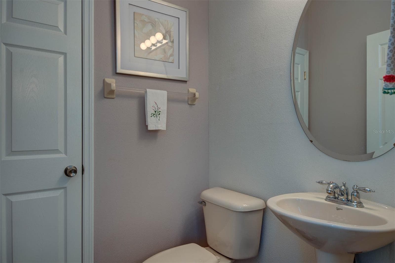 powder room on main living area. - 1146 VENETIAN HARBOR DR NE, ST PETERSBURG