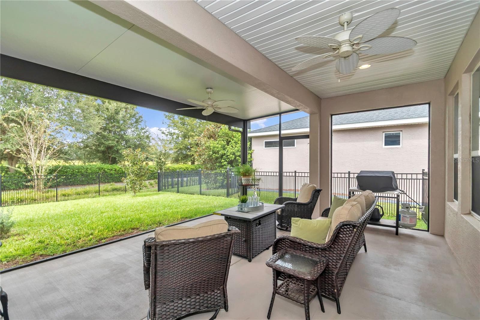 Extended and fully covered and screened lanai. - 4358 NW 57TH AVE, OCALA