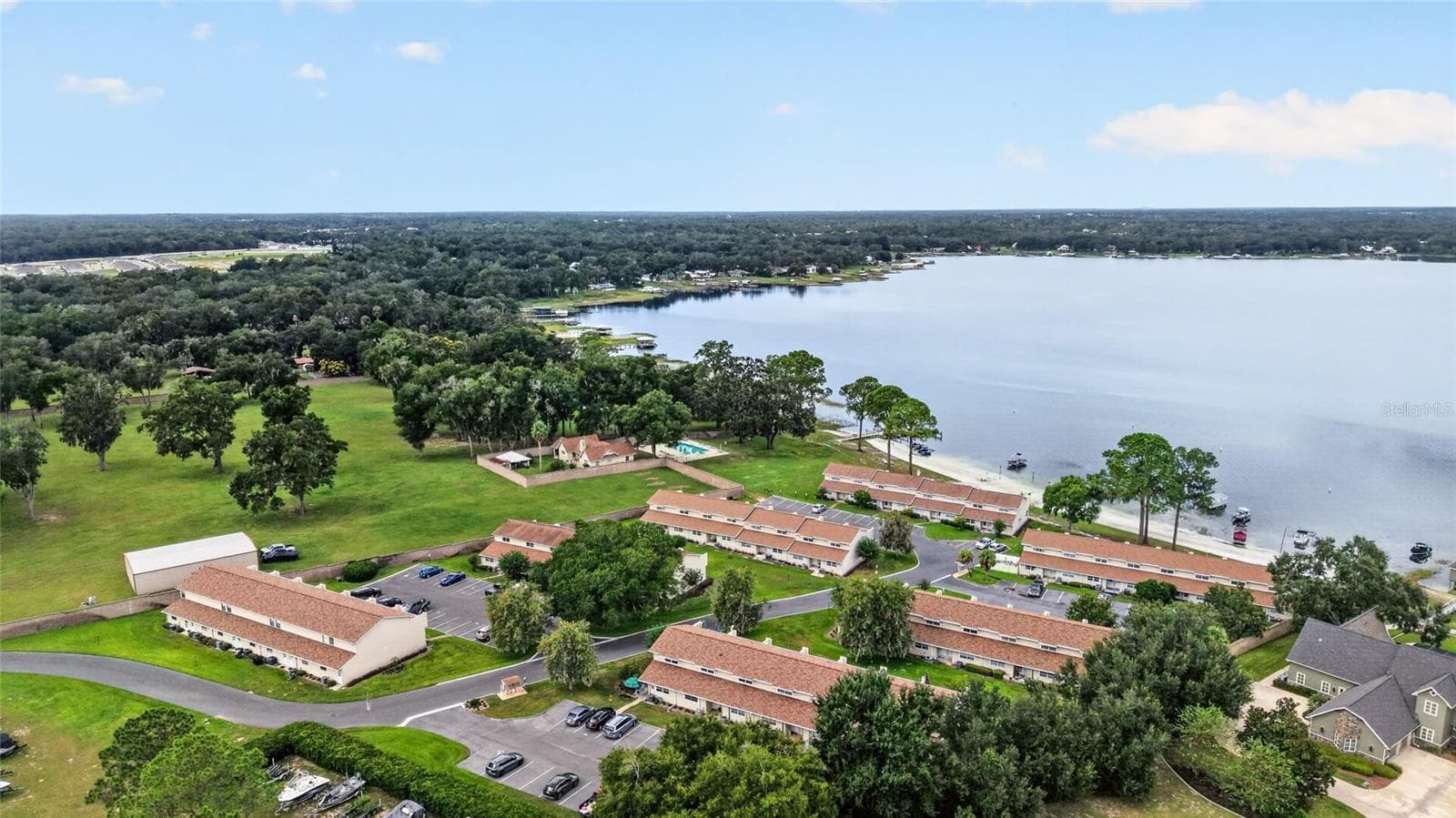 Condominium at 11001 SE SUNSET HARBOR RD #E36, SUMMERFIELD, photo 55 of 78