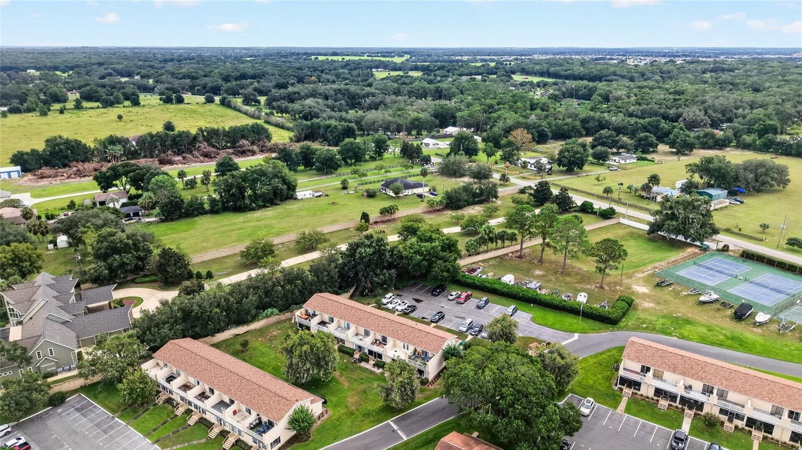 Condominium at 11001 SE SUNSET HARBOR RD #E36, SUMMERFIELD, photo 64 of 78