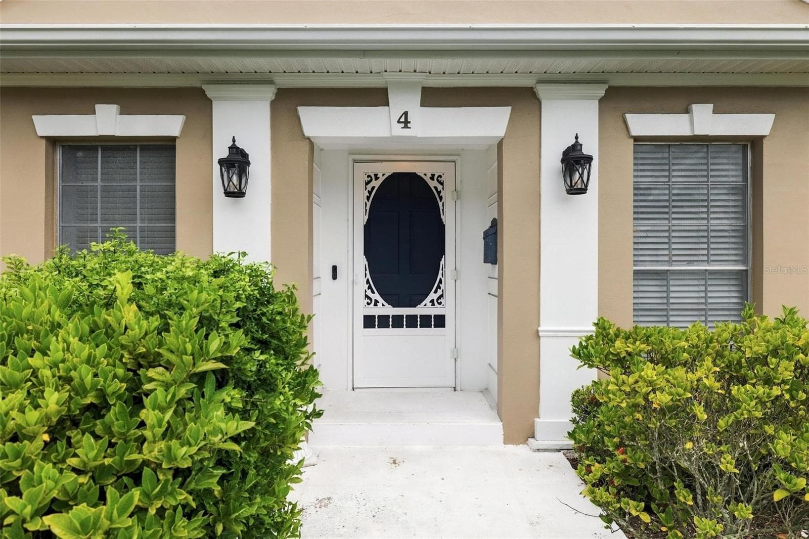 The regal front entrance welcomes all who enter. - 4 ANTIGUA CIR #6, ENGLEWOOD
